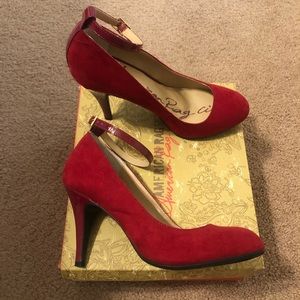 Red, size 9.5, American Rag heels.